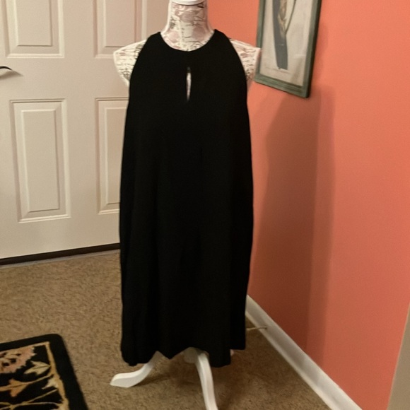 LOFT Dresses & Skirts - LOFT. LOOK AT THE BACK-BEAUTIFUL FLOWY LINED BLACK DRESS. SIZE LARGE. NWT